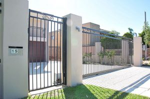 Valencia aluminium fence and sliding gates at a Perth home