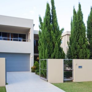 suburban house with fence out the fromt
