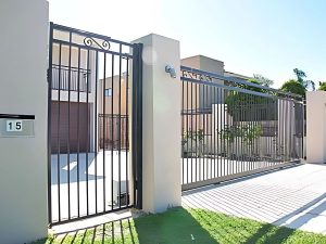 Valencia aluminium fence and sliding gates at a Perth home